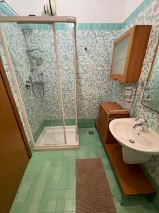 a bathroom with a shower and a sink at Casa Roberta con favolosa terrazza privata in Caorle +69 photos