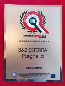 a sign for the bbc esertina pariglia with a logo at B&B Esterita in Parghelia