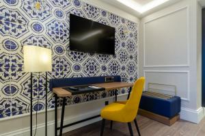 Télévision ou salle de divertissement dans l'établissement Eurostars Lisboa Baixa