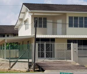 a white house with a fence in front of it at J & I Homestay 2 Person with shared bathroom in Sibu