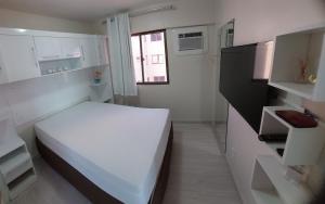Postel nebo postele na pokoji v ubytování Apartamento com 2 quartos de FRENTE PARA O MAR + 27 fotografií