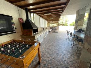 a room with a table and a chess board at Villa Aguacate in Teror