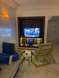 Μια τηλεόραση ή/και κέντρο ψυχαγωγίας στο Appartment le bleu