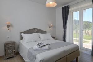 Postel nebo postele na pokoji v ubytování il Lago di Nemi