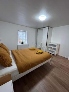 Postel nebo postele na pokoji v ubytování Chez Gina