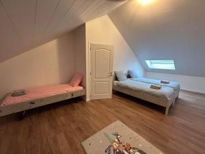 Postel nebo postele na pokoji v ubytování Chez Gina