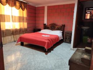Postel nebo postele na pokoji v ubytování Casa Hotel Los Faroles- Samaná/Caldas
