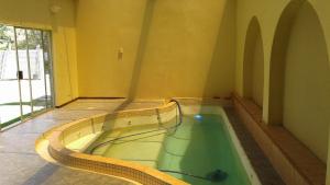 a pool of water in a room with at Pablo Guesthouse in Ermelo