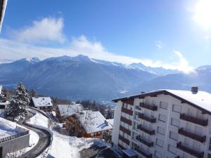 Nespecifikovaný výhled na hory nebo výhled na hory při pohledu z apartmánu