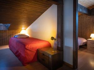 Voodi või voodid majutusasutuse Apartment Jorasse C 20 by Interhome toas