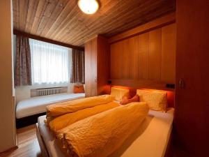 Posteľ alebo postele v izbe v ubytovaní Apartment Scheiber by Interhome + 17 fotografií