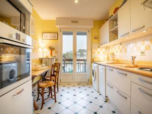 a kitchen with a sink and a dishwasher at Apartment Cardella by Interhome in Saint Malo