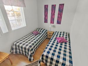 En eller flere senge i et værelse på Holiday Home Jahtikaltio 3 by Interhome + 20 billeder