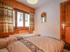 Postel nebo postele na pokoji v ubytování Apartment Dent Favre A 5 by Interhome