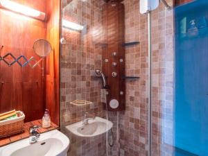 a bathroom with a sink and a shower at Apartment L'Orée du Parc by Interhome in Saint-Gervais-les-Bains