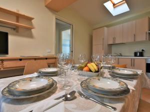 Kuchyň nebo kuchyňský kout v ubytování Apartment Duomo Mansarda by Interhome + 26 fotografií