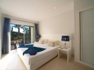 Postel nebo postele na pokoji v ubytování Apartment Pine Hills Rubi by Interhome
