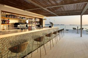 De lounge of bar bij The Signature Level at TRS Ibiza Hotel - All Inclusive Adults Only - Entrance to Clubs included