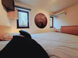 Postel nebo postele na pokoji v ubytování Le Ri de Vâ Maboge La Roche en Ardenne