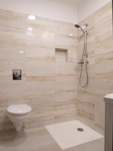 A bathroom at Andoravendégház - Villány