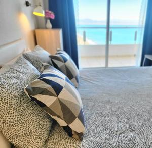 Postel nebo postele na pokoji v ubytování Apartamento Amanecer