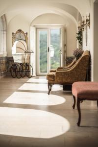 Гостиная зона в Hotel Casa Palmela - Small Luxury Hotels of The World, Hotel & Villas