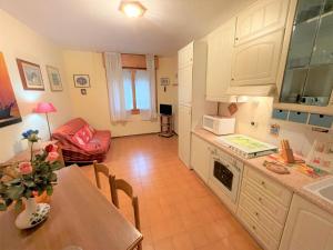 Η κουζίνα ή μικρή κουζίνα στο Condominio Miriam