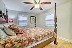 a bedroom with a bed and a ceiling fan at Charming Hamden Home 2 Mi to Yale University in Hamden