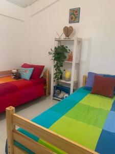 A bed or beds in a room at Casa Terrasini