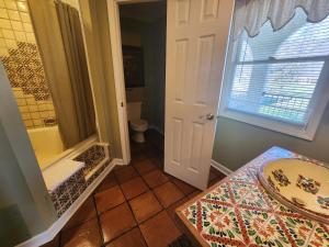 a bathroom with a shower and a sink and a toilet at Williams Island Room at Tennessee RiverPlace in Chattanooga +74 photos