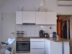 Köök või kööginurk majutusasutuses Strand Apartman
