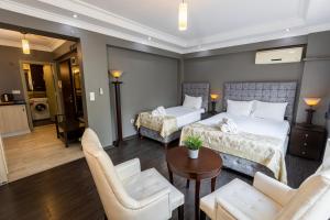 Postel nebo postele na pokoji v ubytování Cumbali Luxury Boutique Hotel