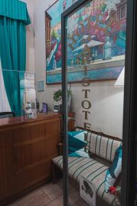 Tempat tidur dalam kamar di Hotel Aristotele