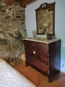 A bed or beds in a room at Cobert de Martí