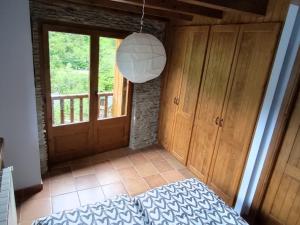 A bed or beds in a room at Cobert de Martí