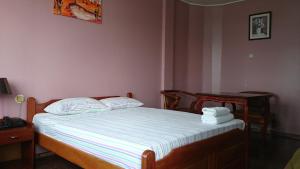 Postel nebo postele na pokoji v ubytování Hotel Paramuru