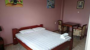 Postel nebo postele na pokoji v ubytování Hotel Paramuru