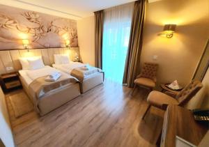 Letto o letti in una camera di Papuli rooms 4U