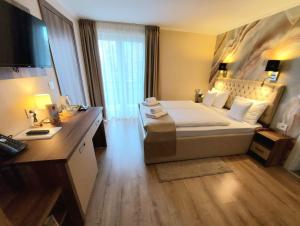 Letto o letti in una camera di Papuli rooms 4U