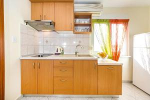 Küche/Küchenzeile in der Unterkunft Apartments Elvir Nin