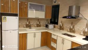 Köök või kööginurk majutusasutuses يان للشقق المخدومة - Yan Apartments