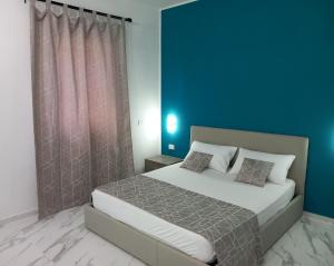 Ліжко або ліжка в номері Jacuzzi Suite King
