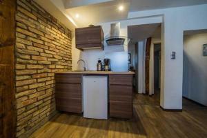 Kuchyň nebo kuchyňský kout v ubytování Guesthouse Le Vauban