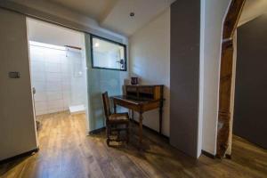 TV a/nebo společenská místnost v ubytování Guesthouse Le Vauban
