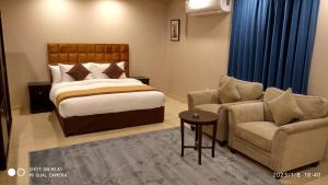Voodi või voodid majutusasutuse يان للشقق المخدومة - Yan Apartments toas