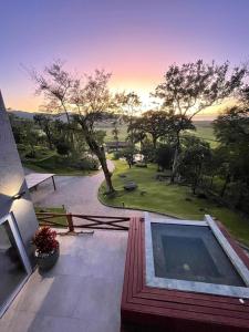 a view of a house with a swimming pool at Casa de Campo - Hospedar com Propósito in Florianópolis