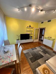 TV a/nebo společenská místnost v ubytování Appartamento Vacanze