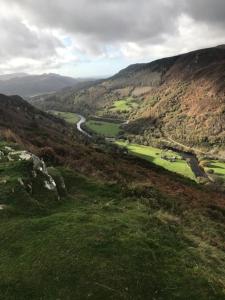 a view of a valley with a river in a mountain at Lawrenny Lodge in Barmouth