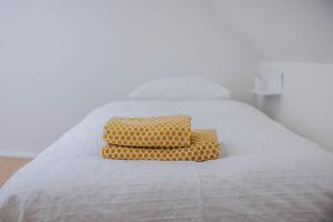 Postel nebo postele na pokoji v ubytování Viktoria Guesthouse