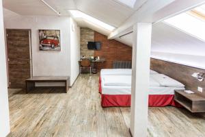 Voodi või voodid majutusasutuse Sorell Hotel Arabelle toas